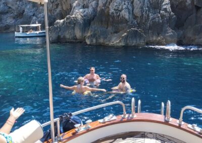 happy friends during a private boat tour with Salvatore Il Tiglio