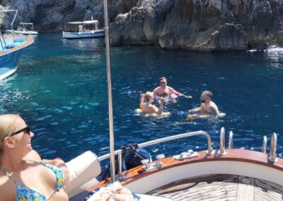 happy friends during a private boat tour with Salvatore Il Tiglio